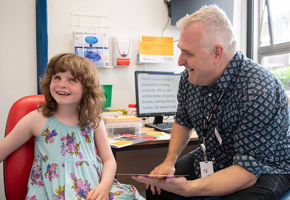ECLO Mark Chapman, at Luton hospital supporting a child with sight loss.