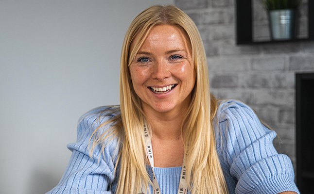 Eye Care Liaison Officer (ECLO), Jenny smiling directly at the camera.