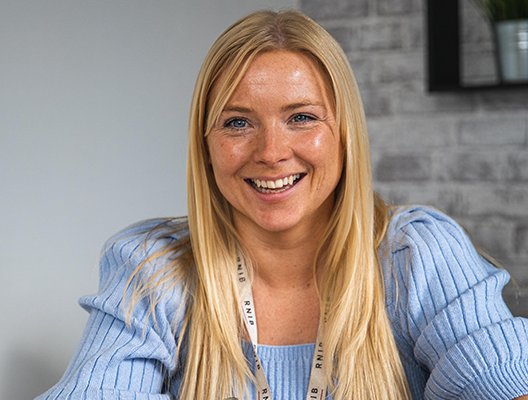 Eye Care Liaison Officer (ECLO), Jenny smiling directly at the camera.