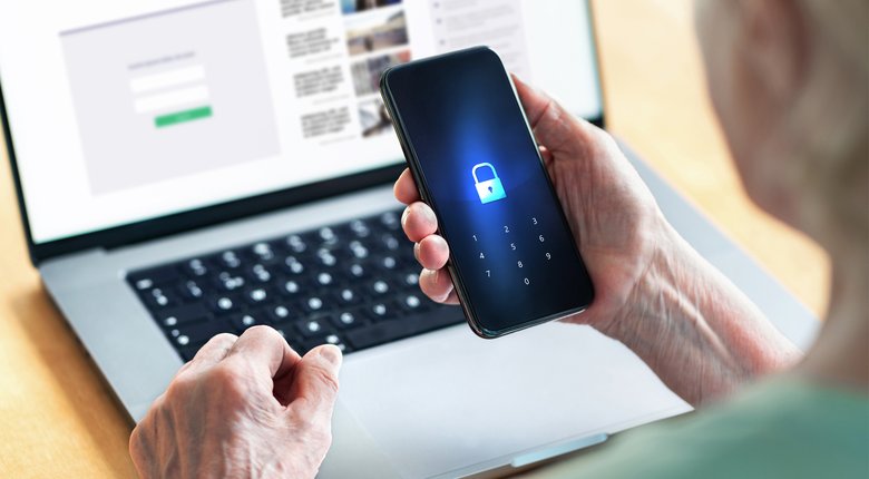 A woman using an authenticator to login to an online account.